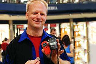 Dave holding stop watching at his Guinness Record.